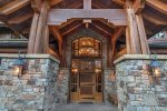 The grand architecture and style begins at the custom front door.